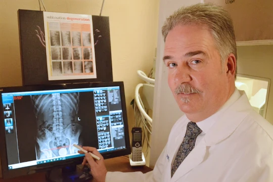 Chiropractor Sacramento CA Gregg C. Anderson, D.C. Showing X-Ray